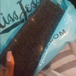 Black studded clutch